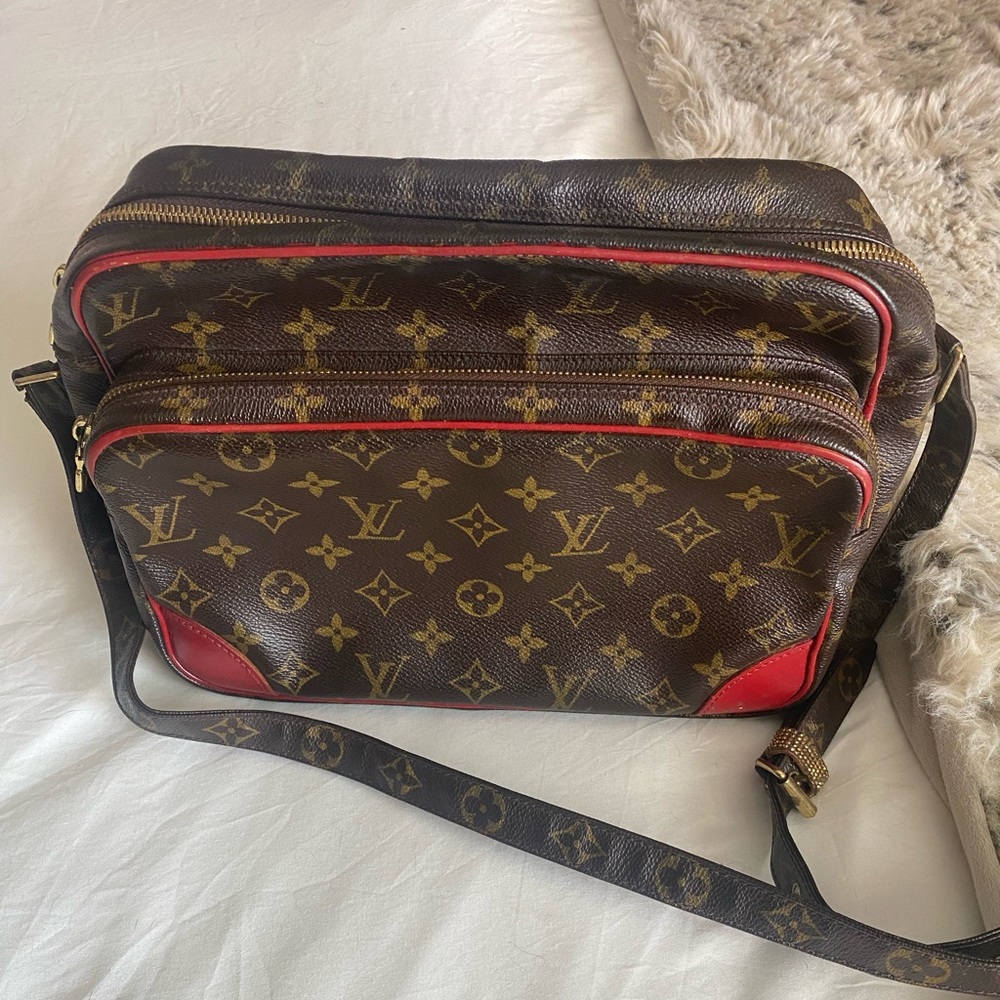 Authentic Louis Vuitton cross body bag